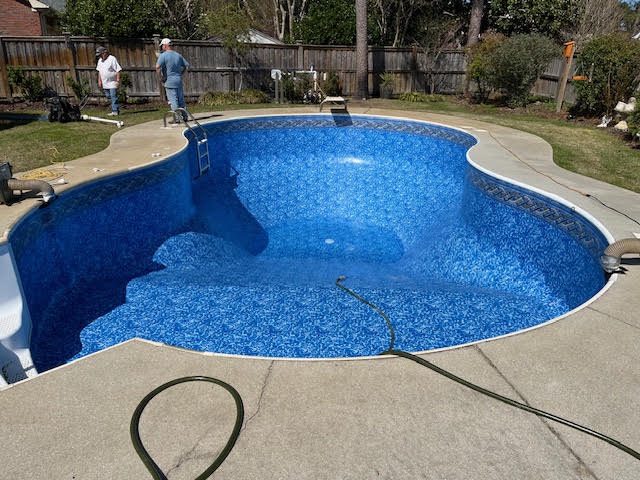 After: Freeform pool &mdash; new liner going in on install day